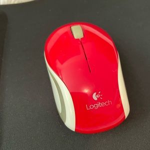 Logitech wireless mini mouse with small pad